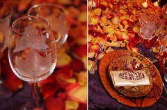 Two glasses of water beside a festive autumn-themed table setting.